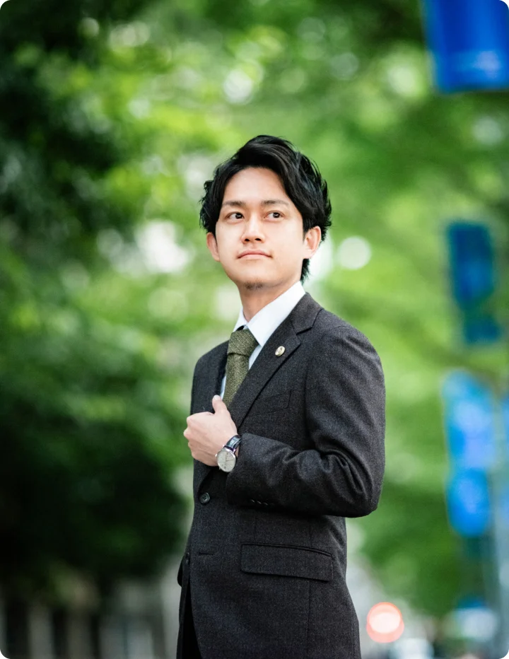 ご挨拶：弁護士 佐藤栄晃の写真